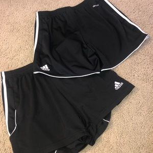 2 black adidas shorts